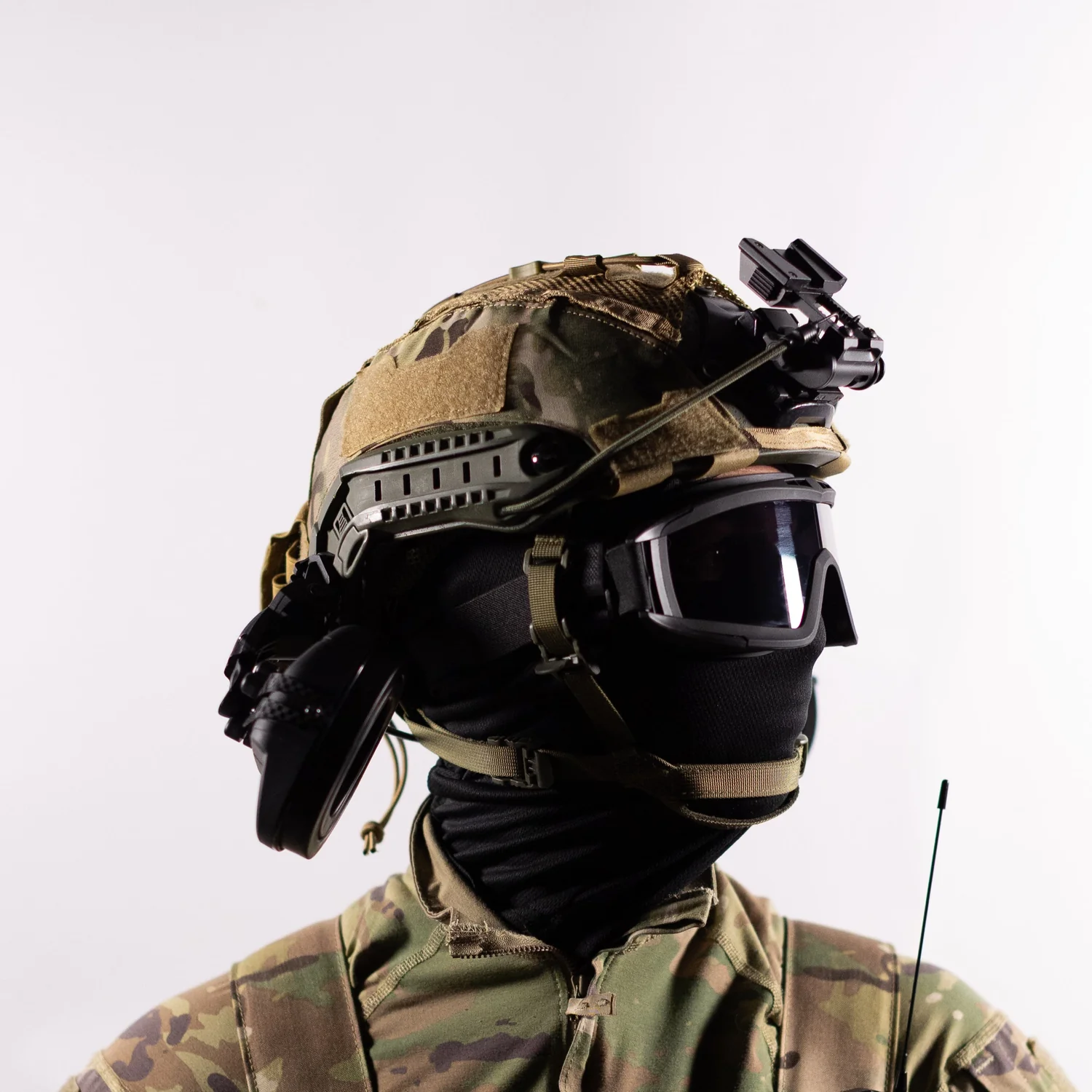 Airsoft player wearing goggles and a helmet